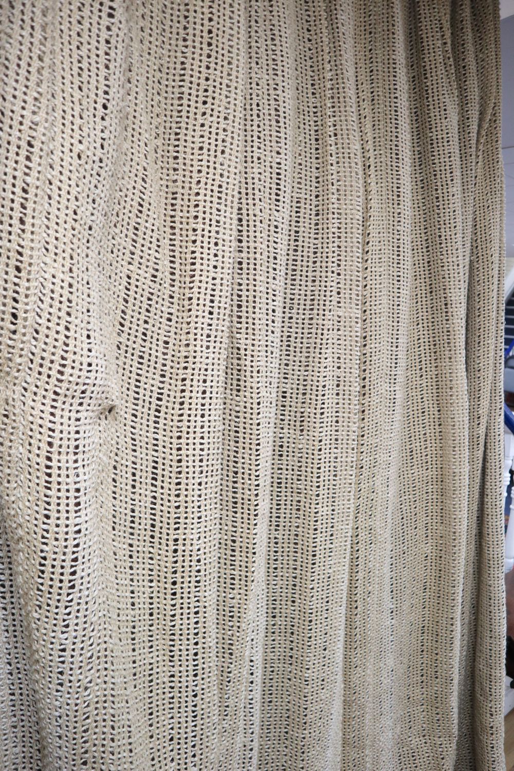 1970's hessian fabric and brown leather curtains, with Paisley fabric trimmed edges.